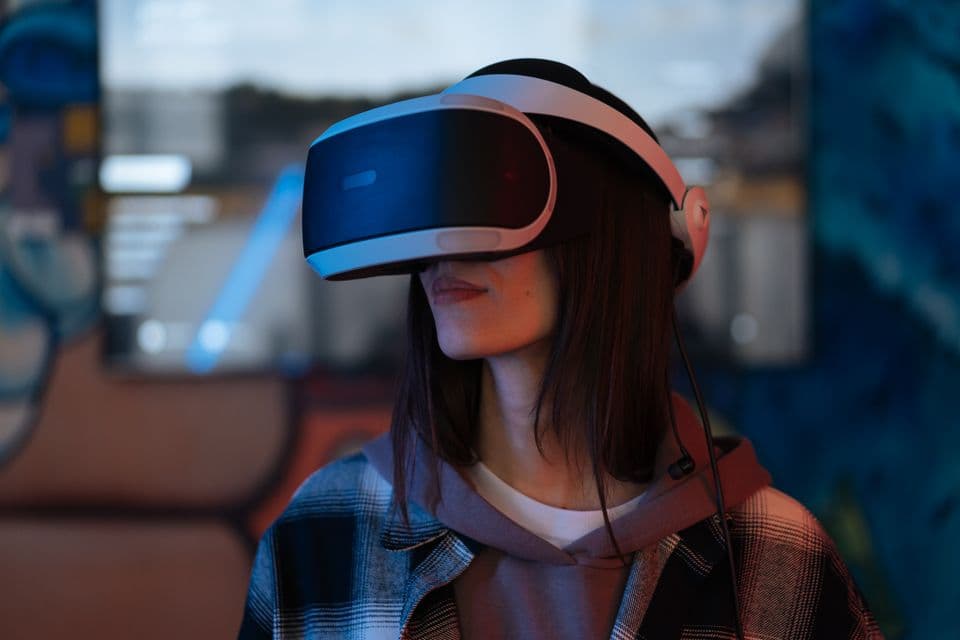 A woman wearing a virtual reality headset